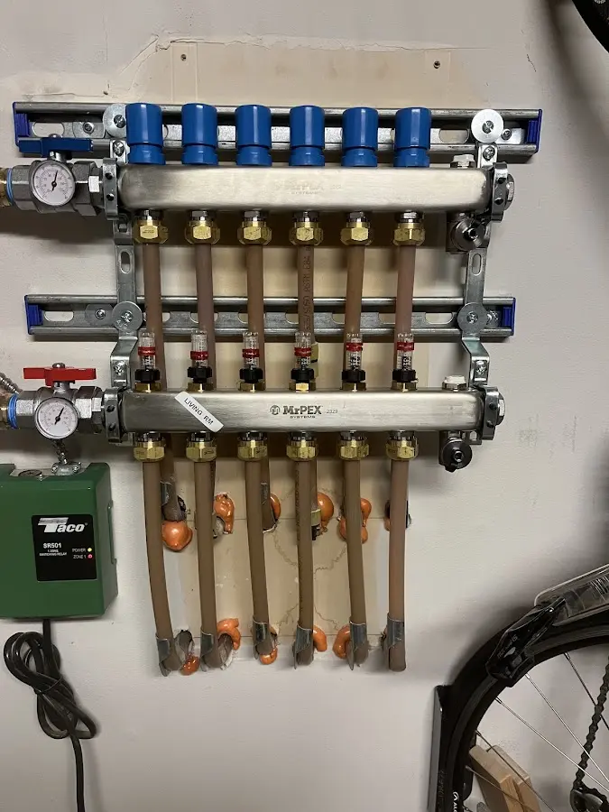 Plumber performing Gas Leak Detection at a residential property in Greenwich